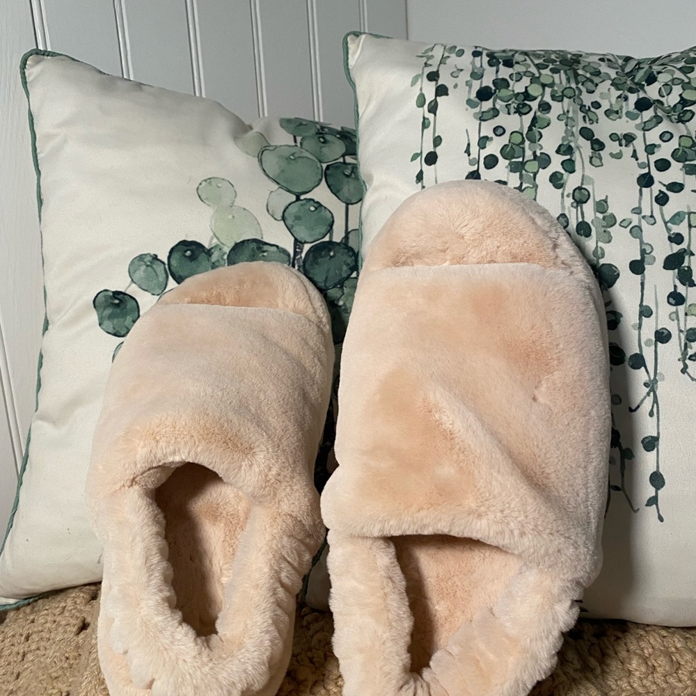 Pink fuzzy slippers